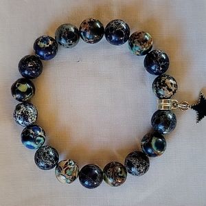 10mm dark blue ocean sediment Jasper with star charm size 7"